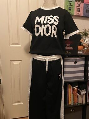 Black & White  Jogger set with Side logo on pant . Cap and bag sold separately *